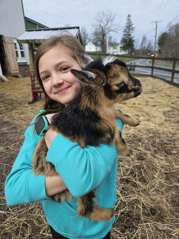 Whenever we see a student smiling like this, we like to call the event a success. Therefore, another successful Outreach event held at Swartz Farm.